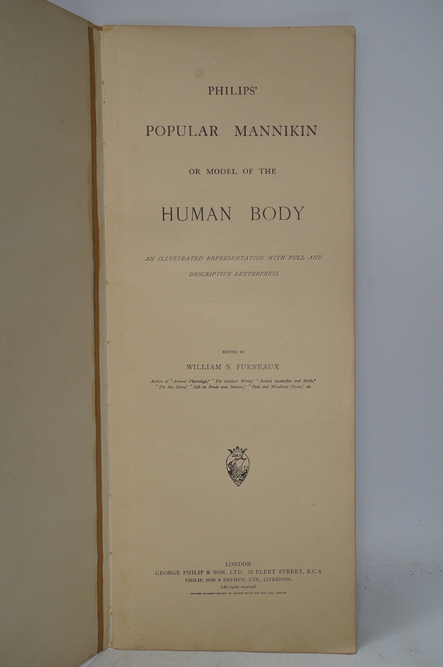 Two late 19th century anatomical publications; Philips’ Popular Manikin, containing a foldout chart of the human body showing cross-sections of the internal organs, etc., 49.5cm x 20cm, together with a large poster style